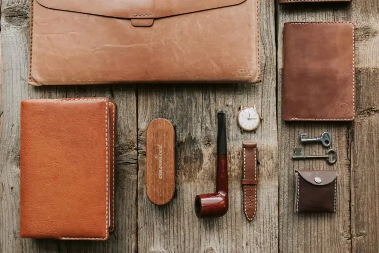 men accessories – stylish backpack, belt, and sunglasses